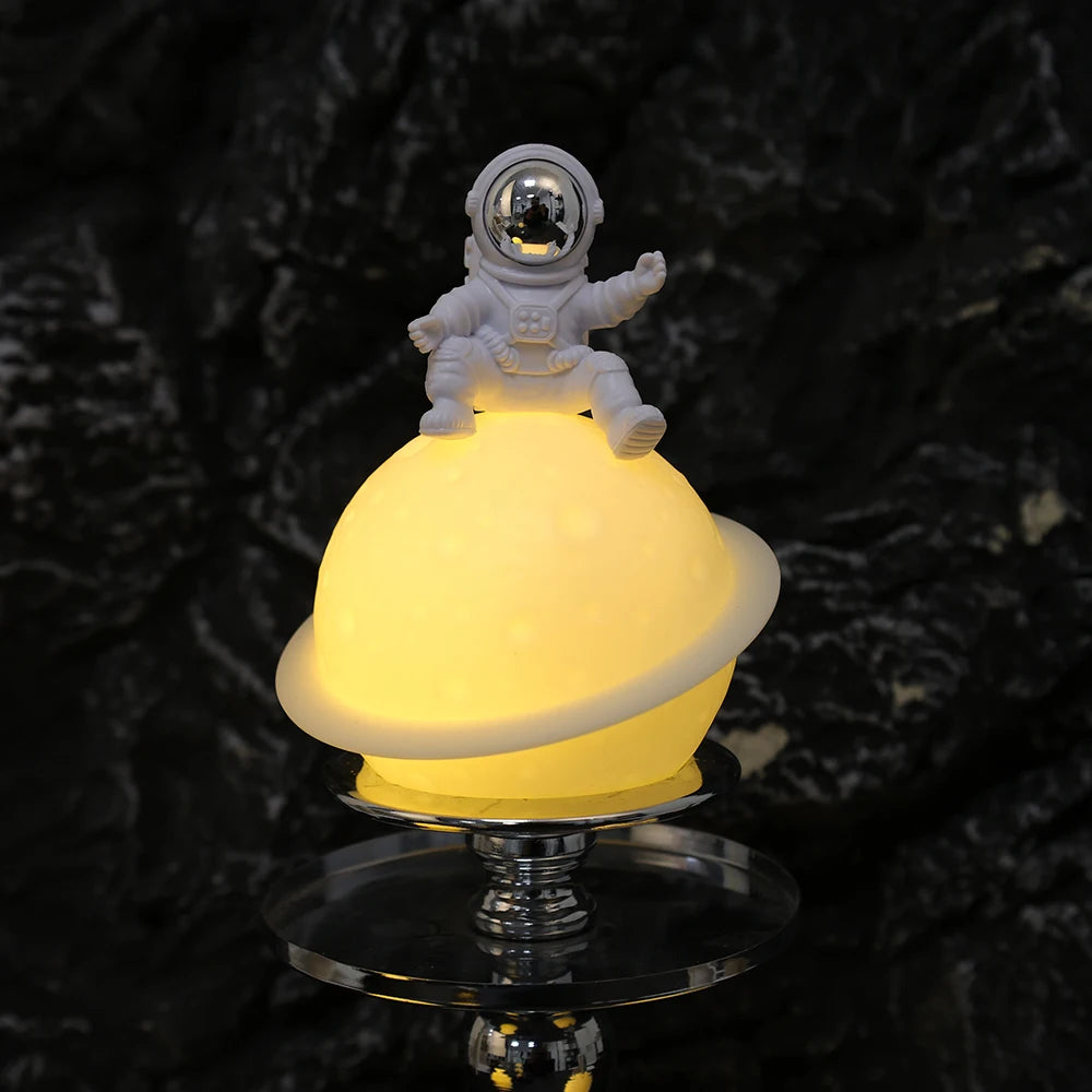 Astronaut Sitting in The Moon Night Light