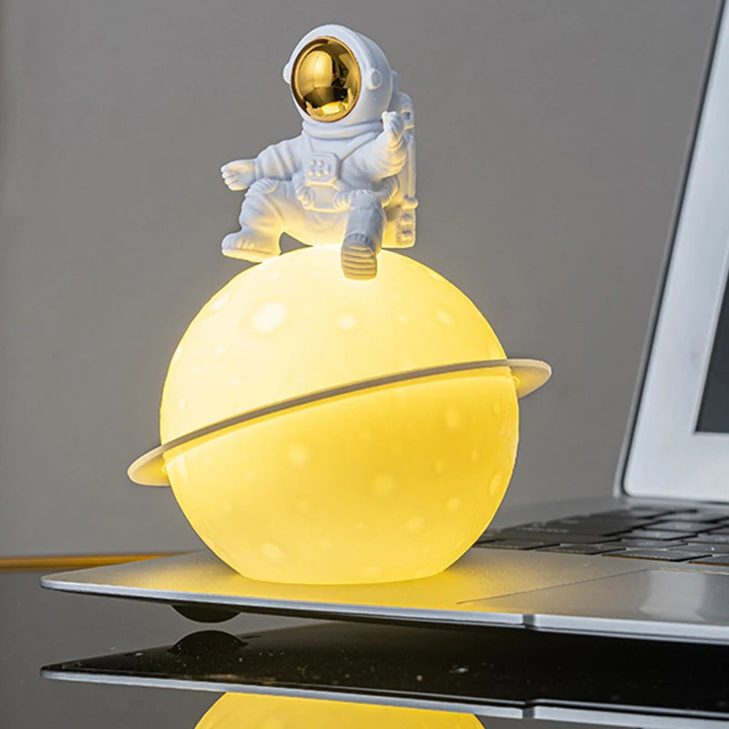 Astronaut Sitting in The Moon Night Light